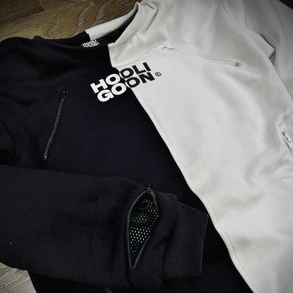 Black and white tee with text on a wooden surface