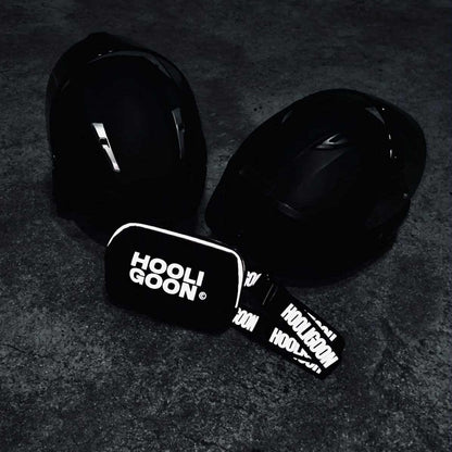 Black bag with 'HOOLIGOON' branding on a dark textured background