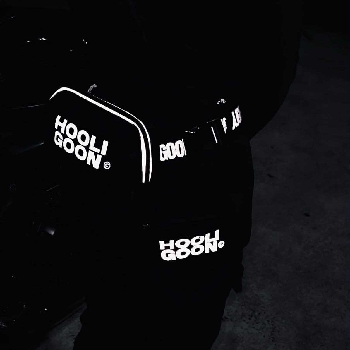 Dark background with 'HOOLIGOON' logo illuminated