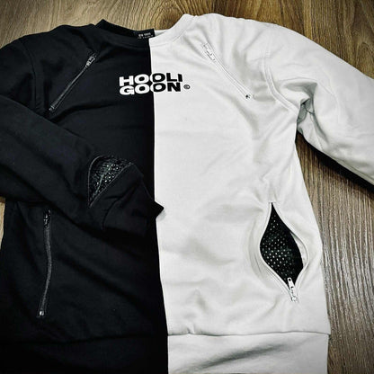 Black and white tee with 'Hooligoon' text on a wooden surface