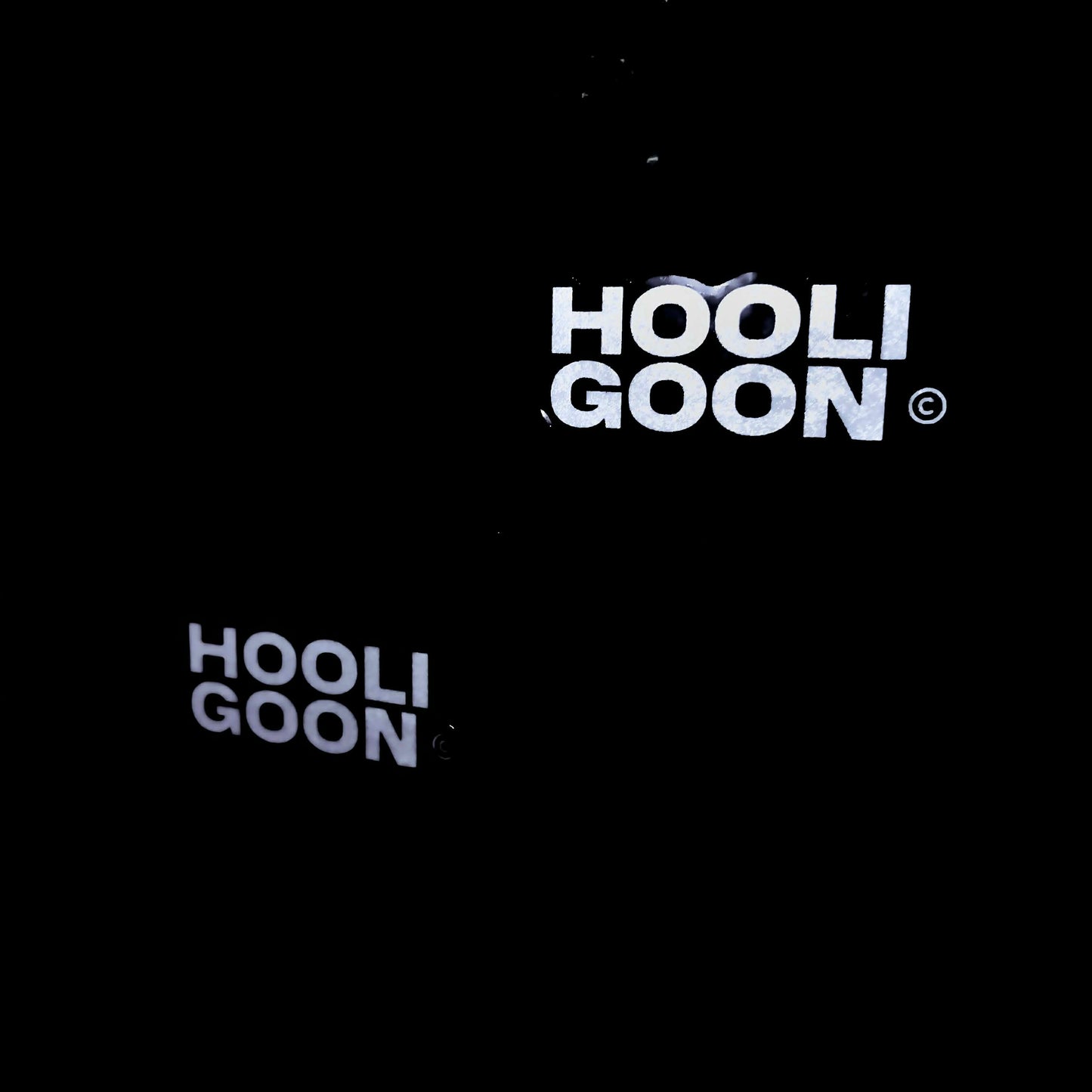 Black background with 'HOOLIGOON' logo in white