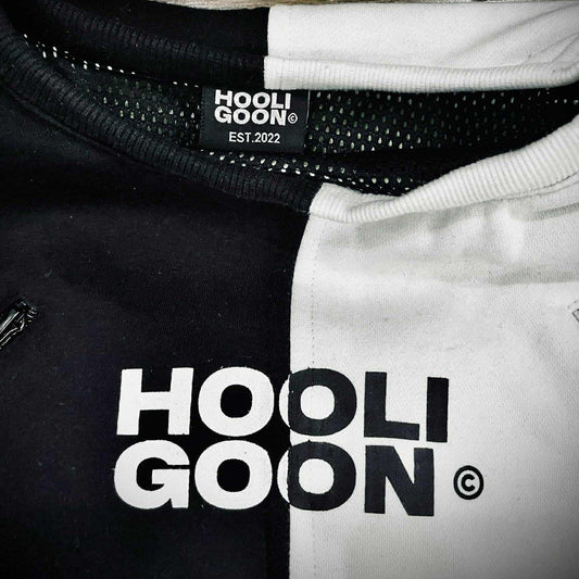 Tee with 'Hooligoon' branding on a wooden surface